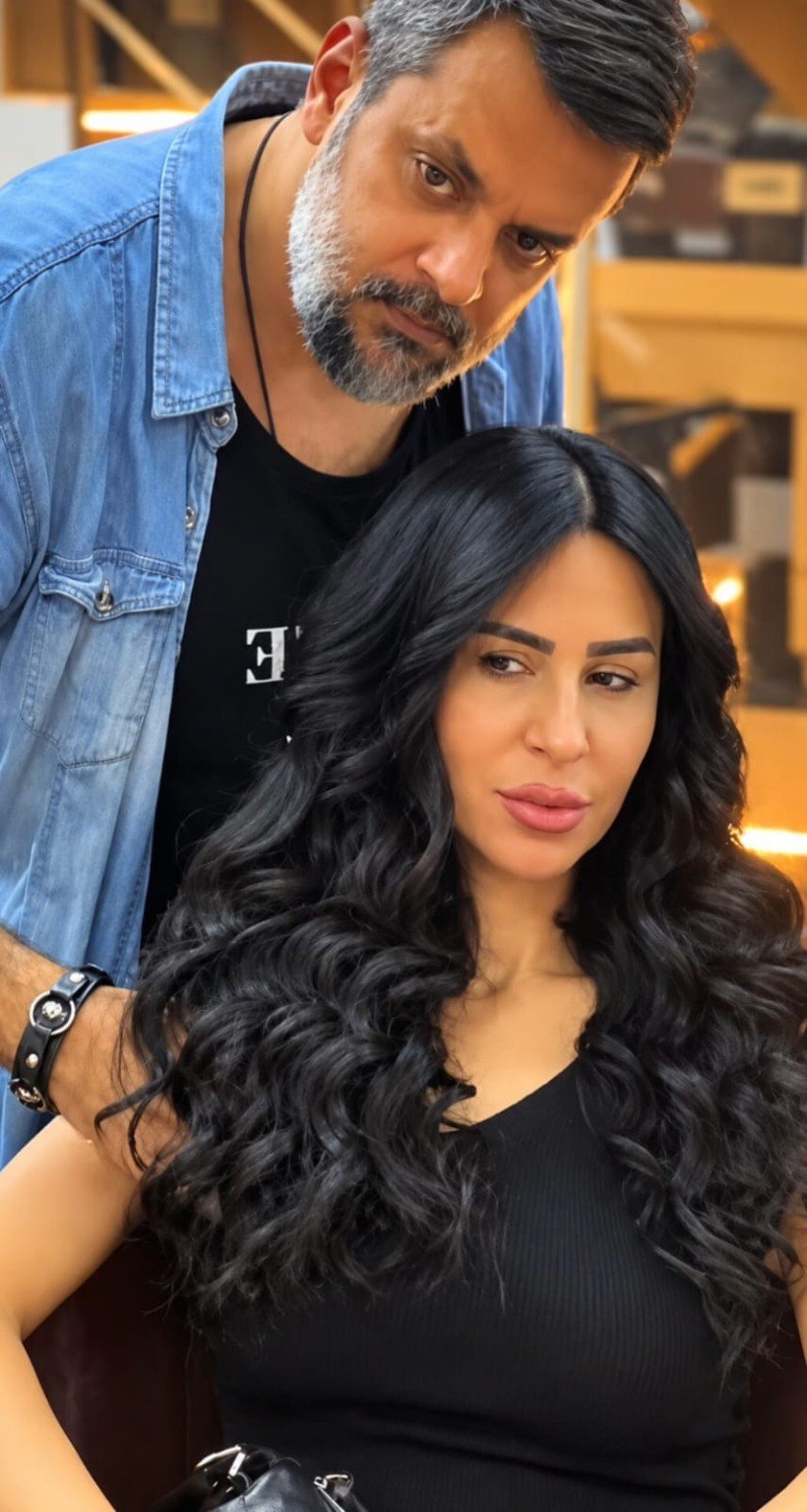 Ezzo with client and glossy black waves
